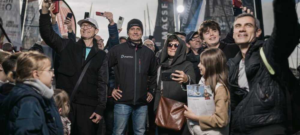 LES SABLES D'OLONNE, FRANCE - OCTOBER 28, 2024: Prysmian skipper Giancarlo Pedote (ITA) is posing with the crowd on pontoons, in a specific series of portraits shot at prestart of the Vendee Globe, on October 28, 2024 in Les Sables d'Olonne, France - (Photo by Vincent Curutchet / Alea)